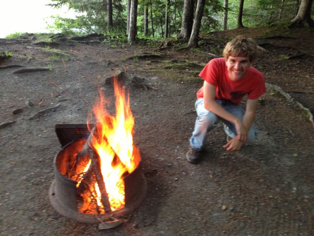 Harrison with campfire
