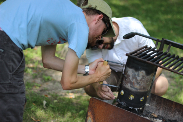 Harrison & Steven building a fire