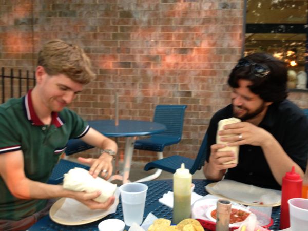 Harrison giving infant CPR to burrito