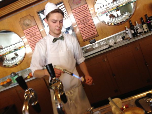 soda fountain employee making marshmallows